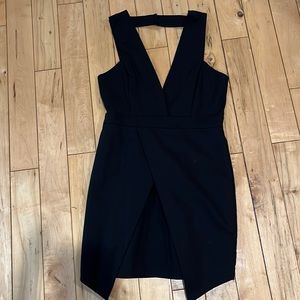 ANGL brand new black mini dress. Never worn with tags!